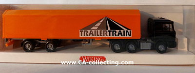 WIKING 5480129 - MAN HU-PAC-SATTELZUG - TRAILERTRAIN. In...